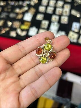 Gold-Tone Floral Pendant with Yellow and Amber Stones